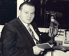 Bruce Skeggs at microphone